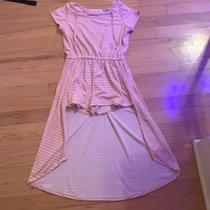 Dress with shorts built in. Also a cross by the neck area.